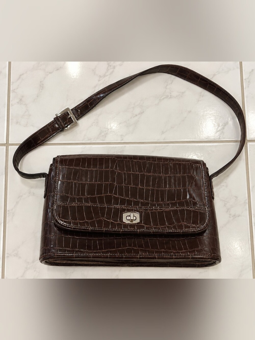 Croc-Embossed Brown Crossbody Bag. Turn Lock Closure.